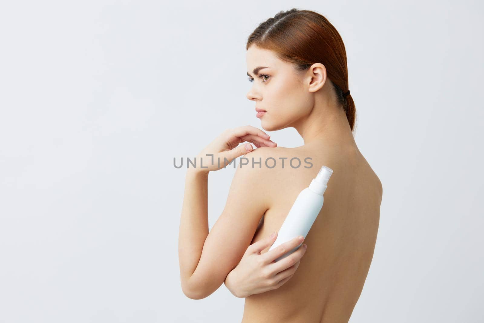 beautiful woman body lotion rejuvenation cosmetics isolated background by SHOTPRIME