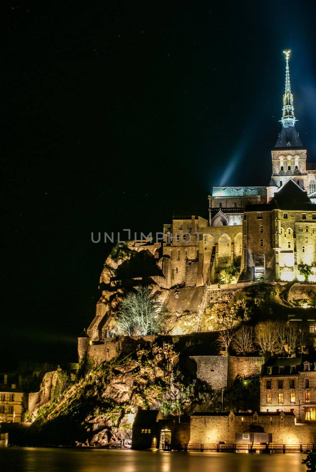 Night view of Mont-Saint Michel Lighted up. Shooting Location: France, Normandy Region