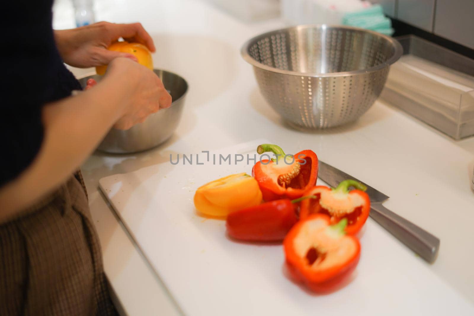 Cooking scene using paprika. Shooting Location: Yokohama-city kanagawa prefecture