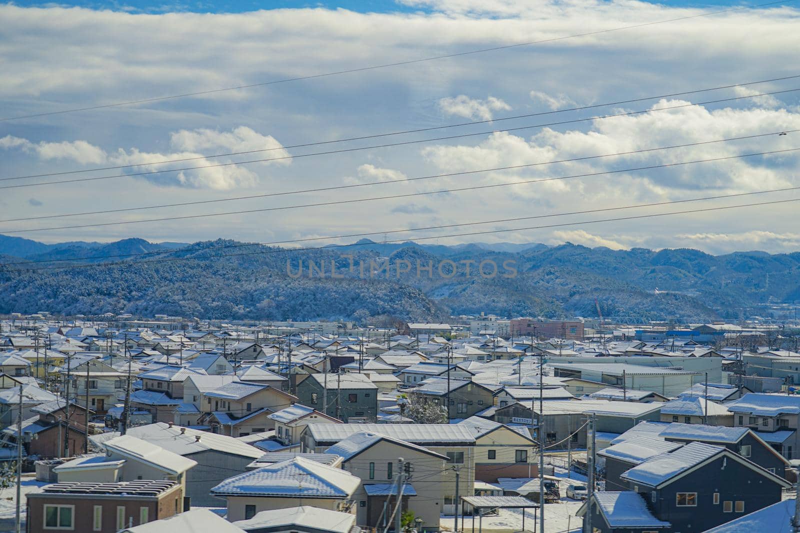 Image of the city of Fukushima covered with snow. Shooting Location: Fukushima Prefecture
