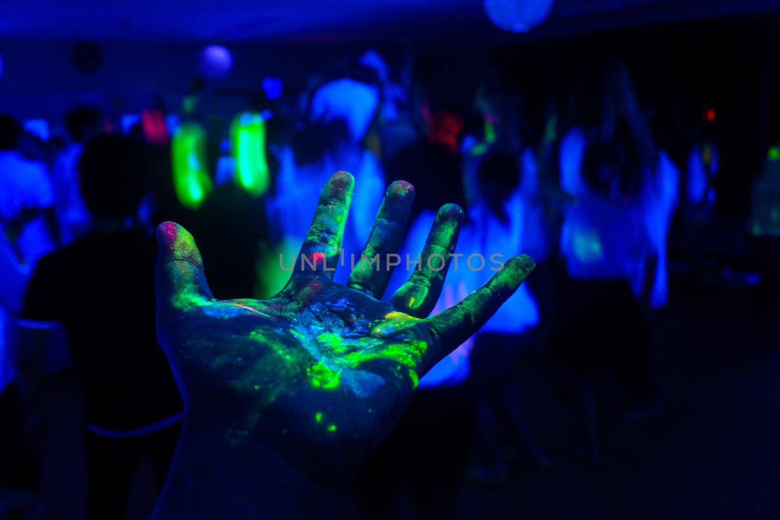 Hand with fluorescent paint. Shooting Location: Tokyo metropolitan area