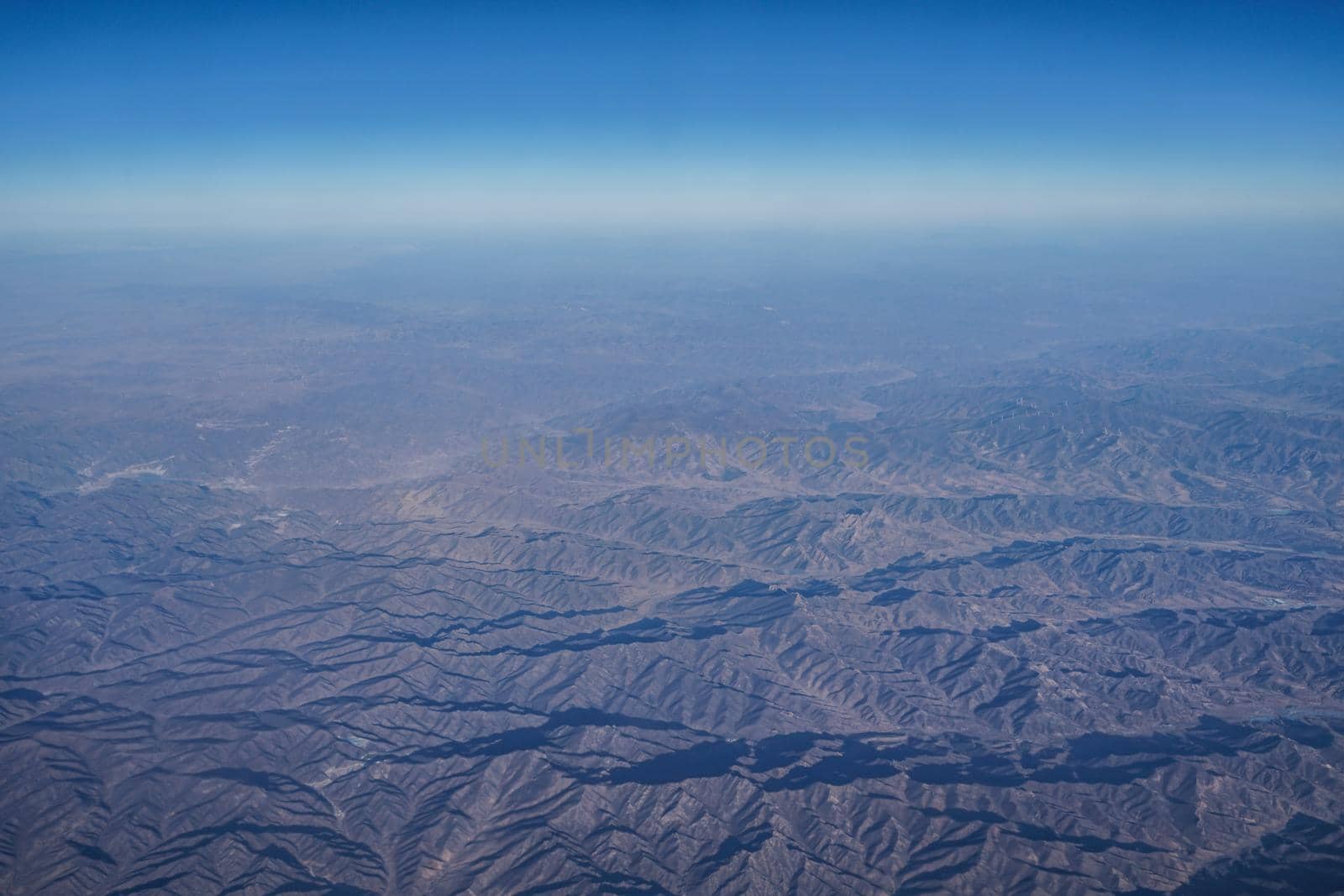 Chinese mountainous zone that can be seen from the plane. Shooting Location: China, Beijing