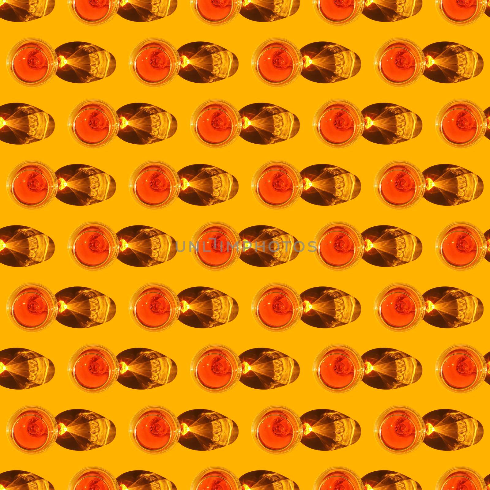 seamless pattern cognac glass with a hard shadow on a yellow background. High quality photo