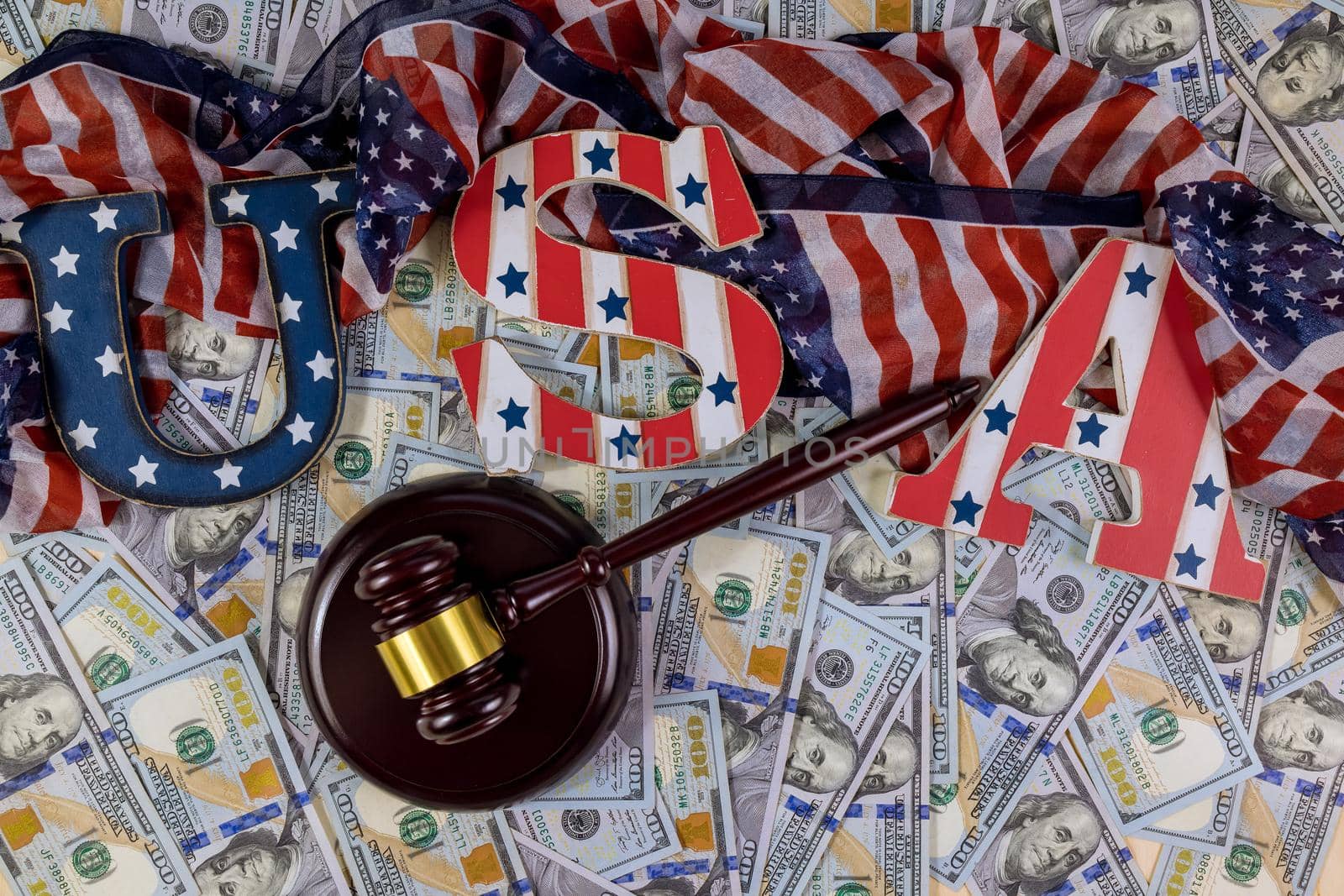 US financial regulation of arrest of property economic US sanctions with USA flag US dollars banknotes Judge gavel