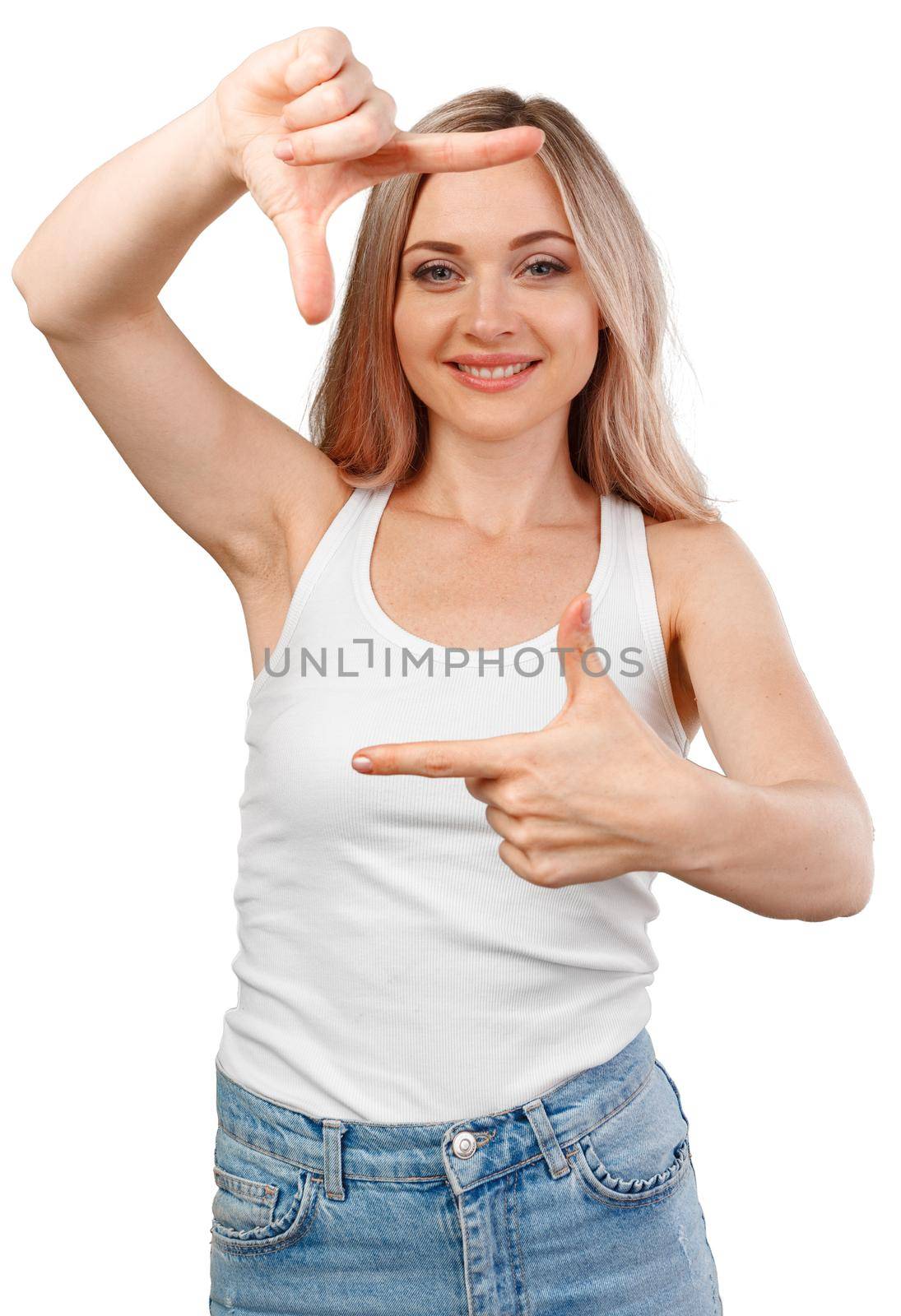 Close up of happy young girl showing frame with fingers isolated on white background