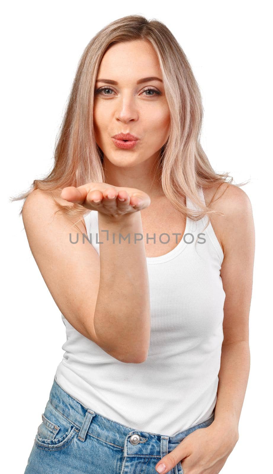 Pretty blonde woman blows kiss into camera isolated on white background, close up