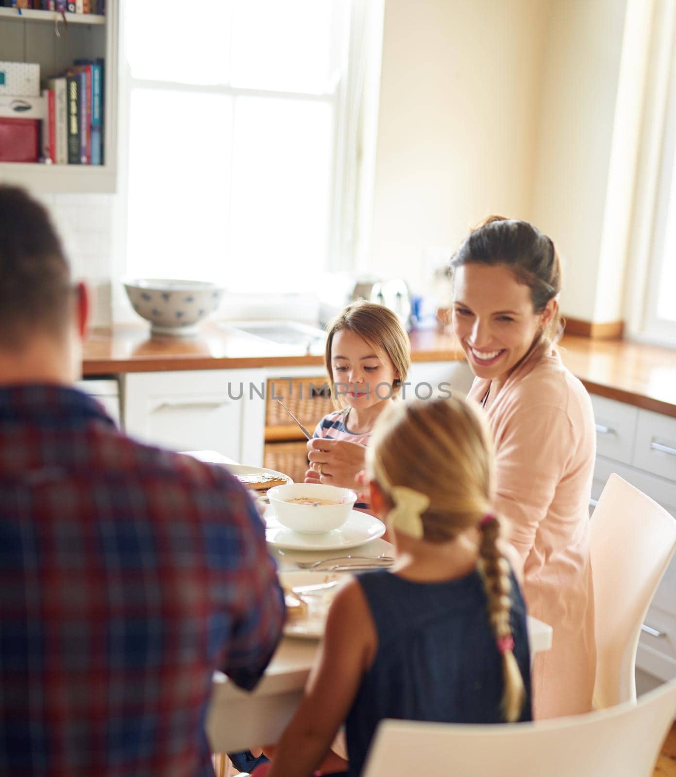 Shot of a family having breakfast together