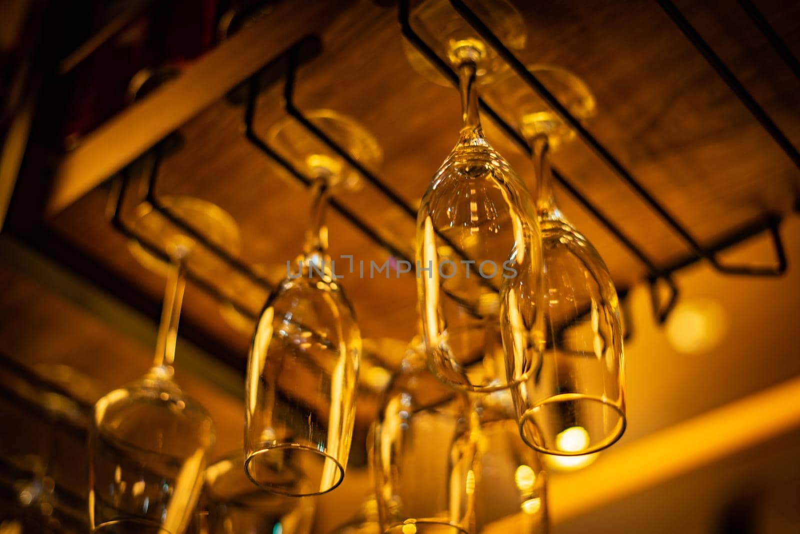 Wine glasses hanging on the ceiling. Shooting Location: Tokyo metropolitan area
