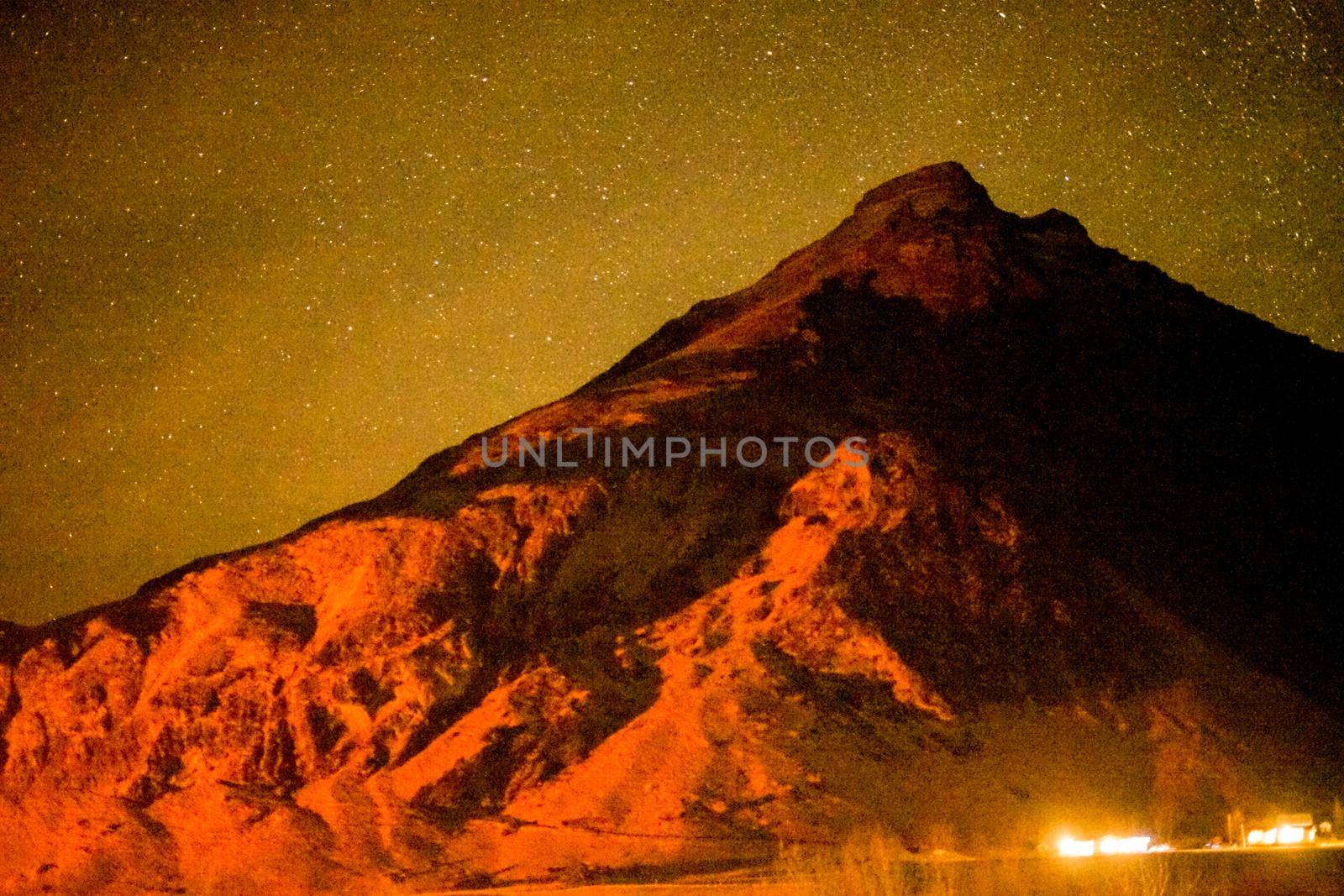 Starry sky and Iceland snowy mountain. Shooting Location: Iceland, Lay Cavik