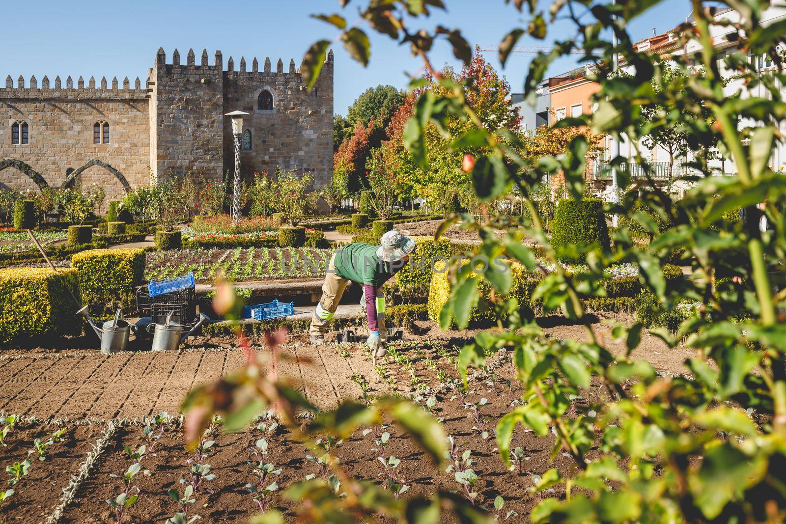 Braga, Portugal - October 27, 2021: Garden of Santa Barbara (Jardim de Santa Barbara) where gardeners work in the historic city center on an autumn day