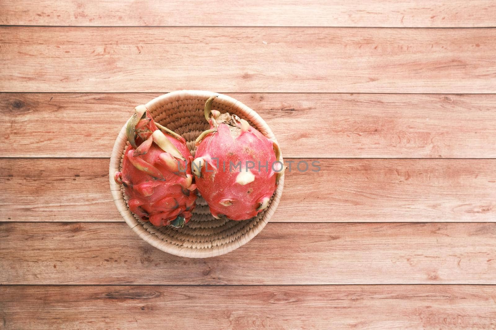 top view of dragon fruit in a bowl on table ,