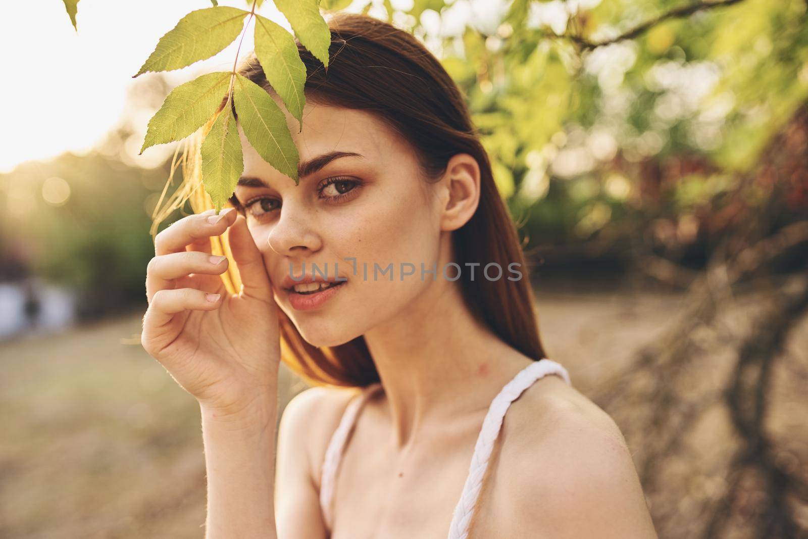 pretty woman glamor nature posing summer close-up. High quality photo