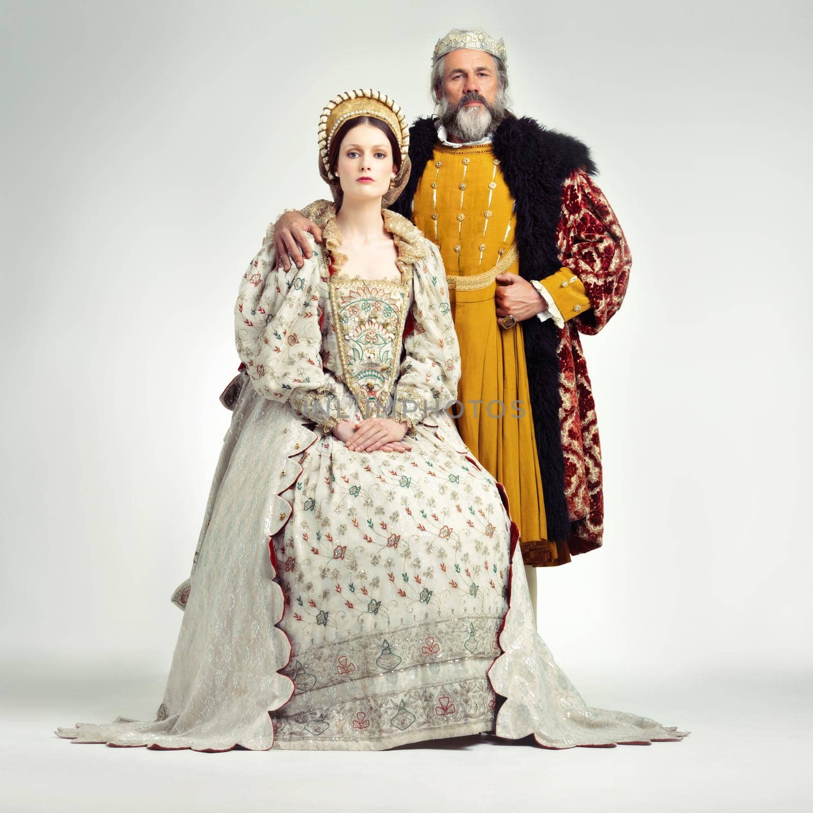 Studio shot of a regal king and queen