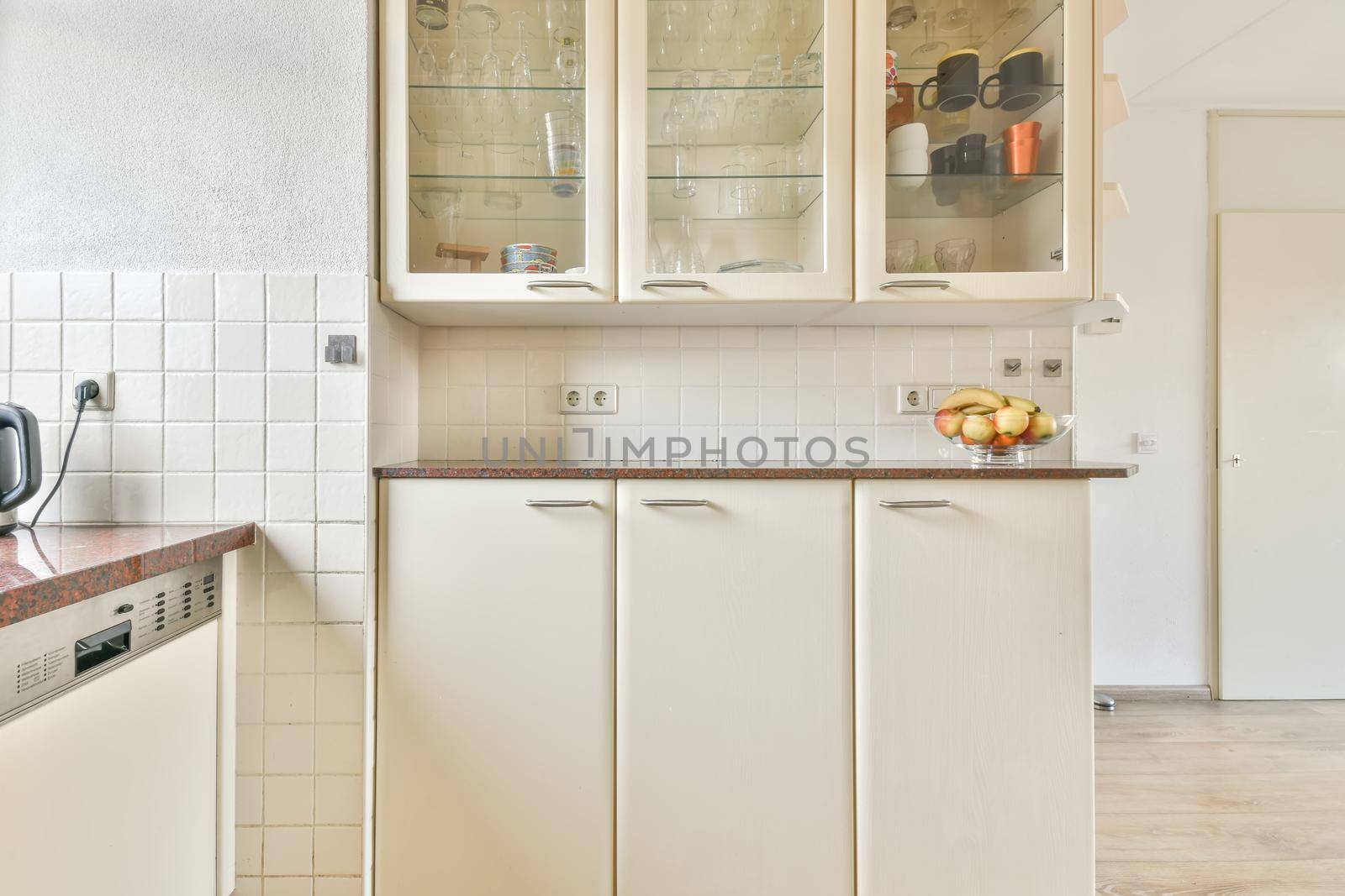 Kitchen in a new luxury home, hardwood floors, dark cabinets