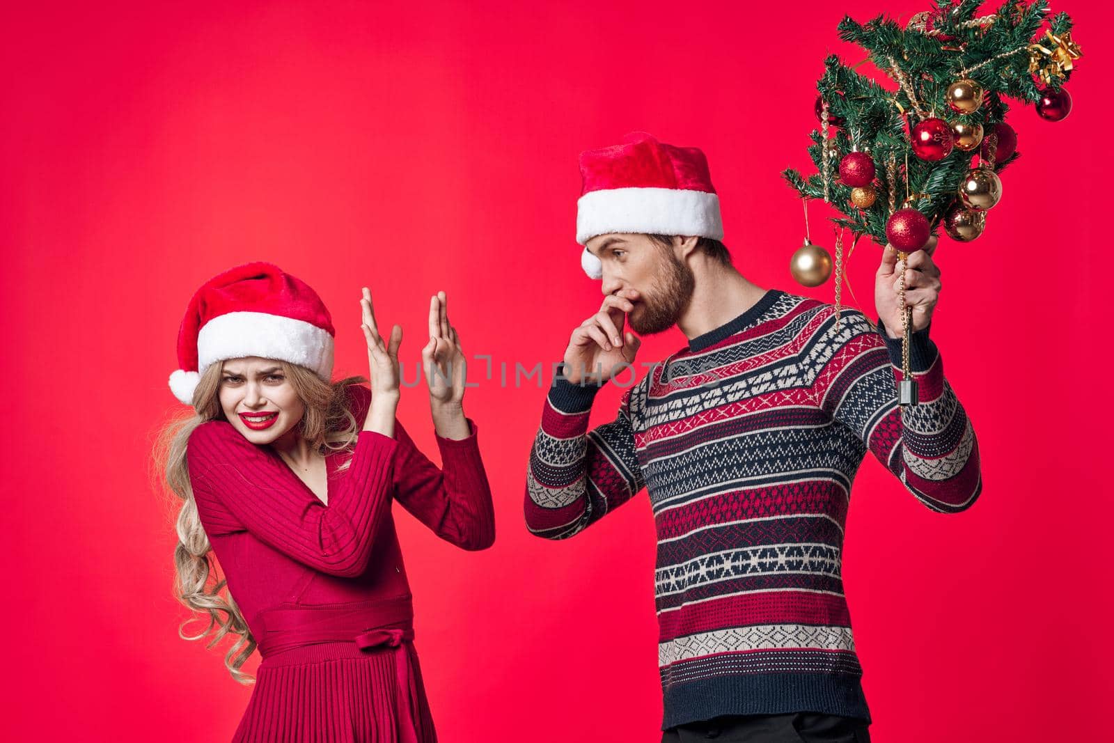cheerful young couple christmas decoration holiday lifestyle by SHOTPRIME