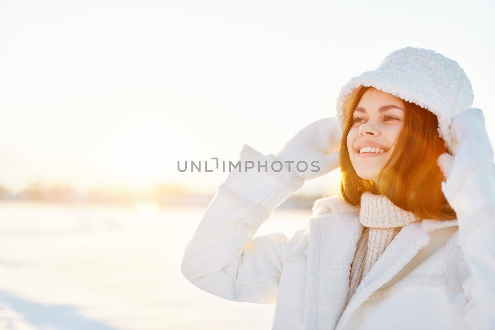 pretty woman in a white coat in a hat winter landscape walk Fresh air by SHOTPRIME