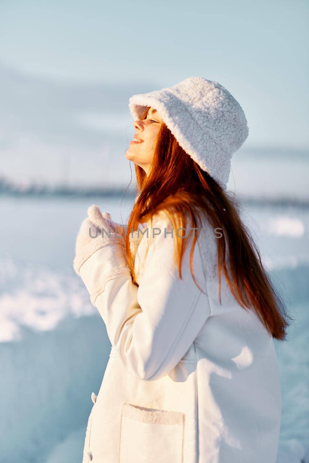 young woman red hair snow field winter clothes Lifestyle. High quality photo