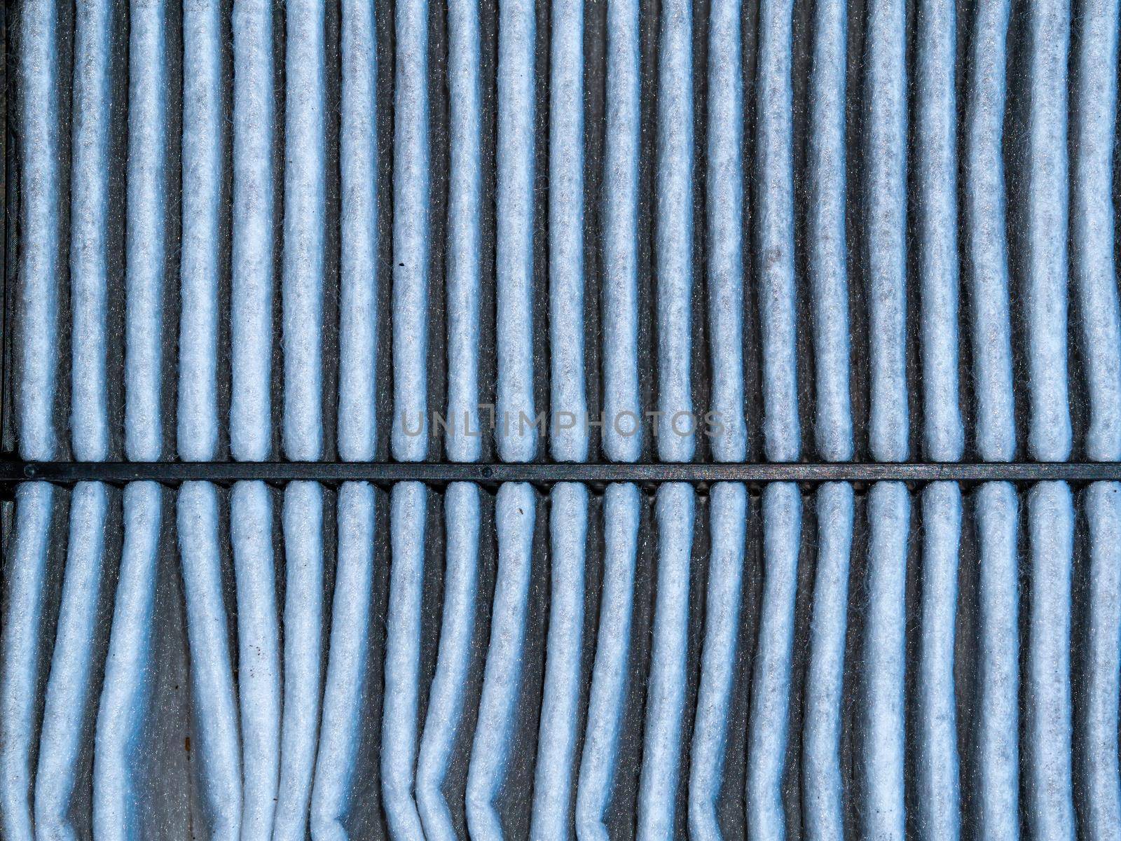 The structure of the air filter of the exhaust system of a car engine. Air filter. Exhaust system. Vehicle repair. Part of the car. Car service. Spare part. Engine exhaust gases. Ecology.