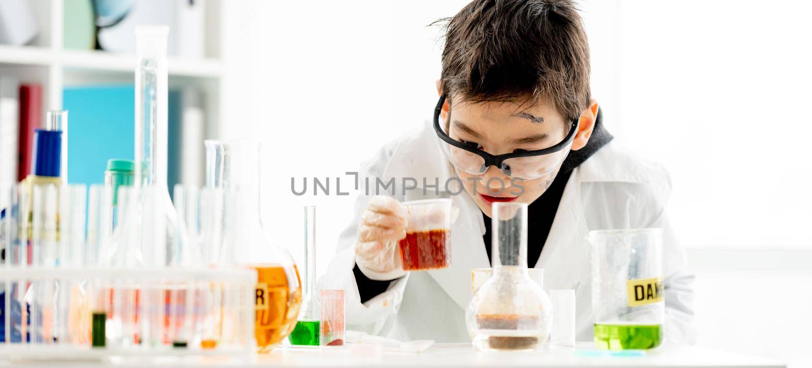 School boy in chemistry class by tan4ikk1