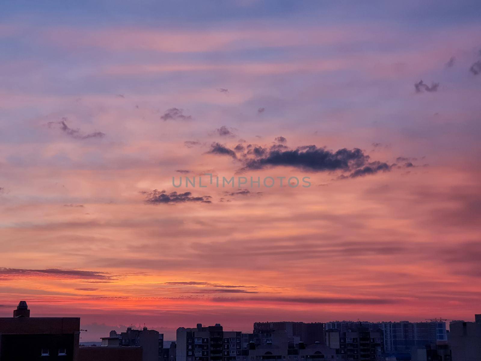 Sunset background with wonderful golden yellow sky, Amazing purple and orange sky in evening