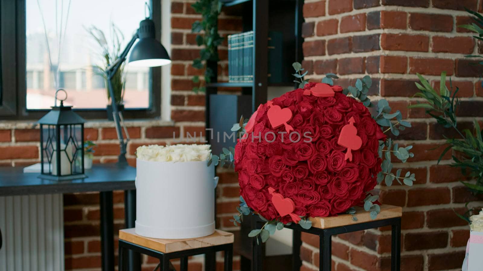 Empty living room with nobody in it decorated by boyfriend with red roses by DCStudio