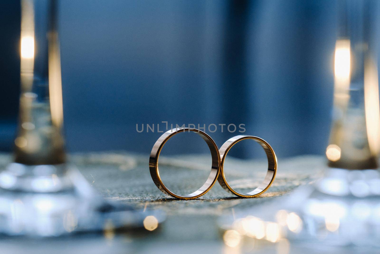 A pair of gold wedding rings.Two wedding rings.