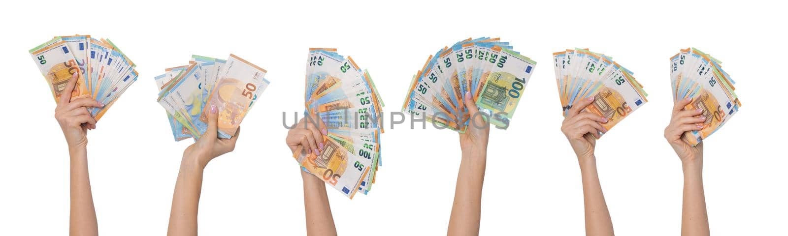 Hands holding euro cash money banknotes isolated on white background. High quality photo