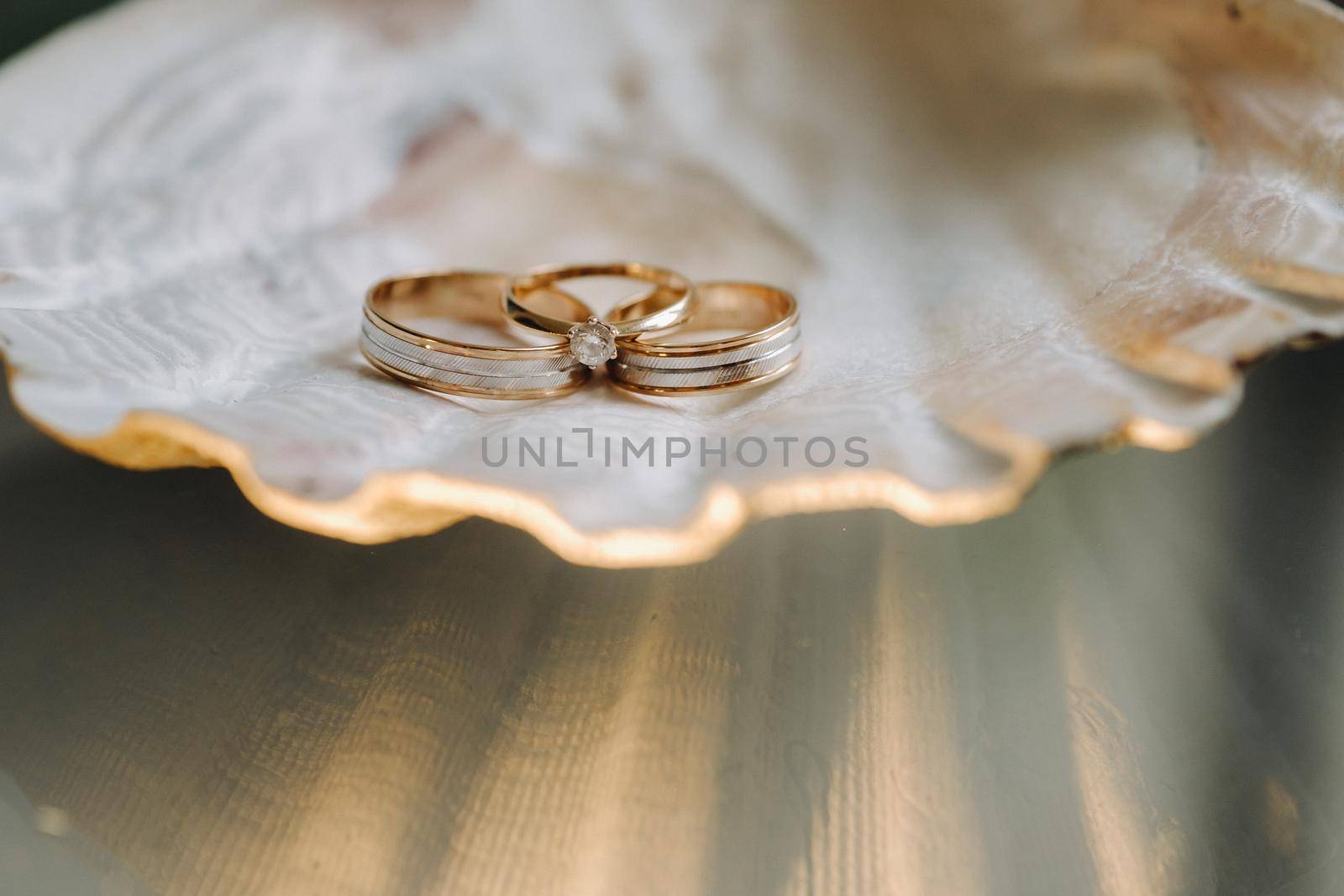 A pair of gold wedding rings.Two wedding rings by Lobachad