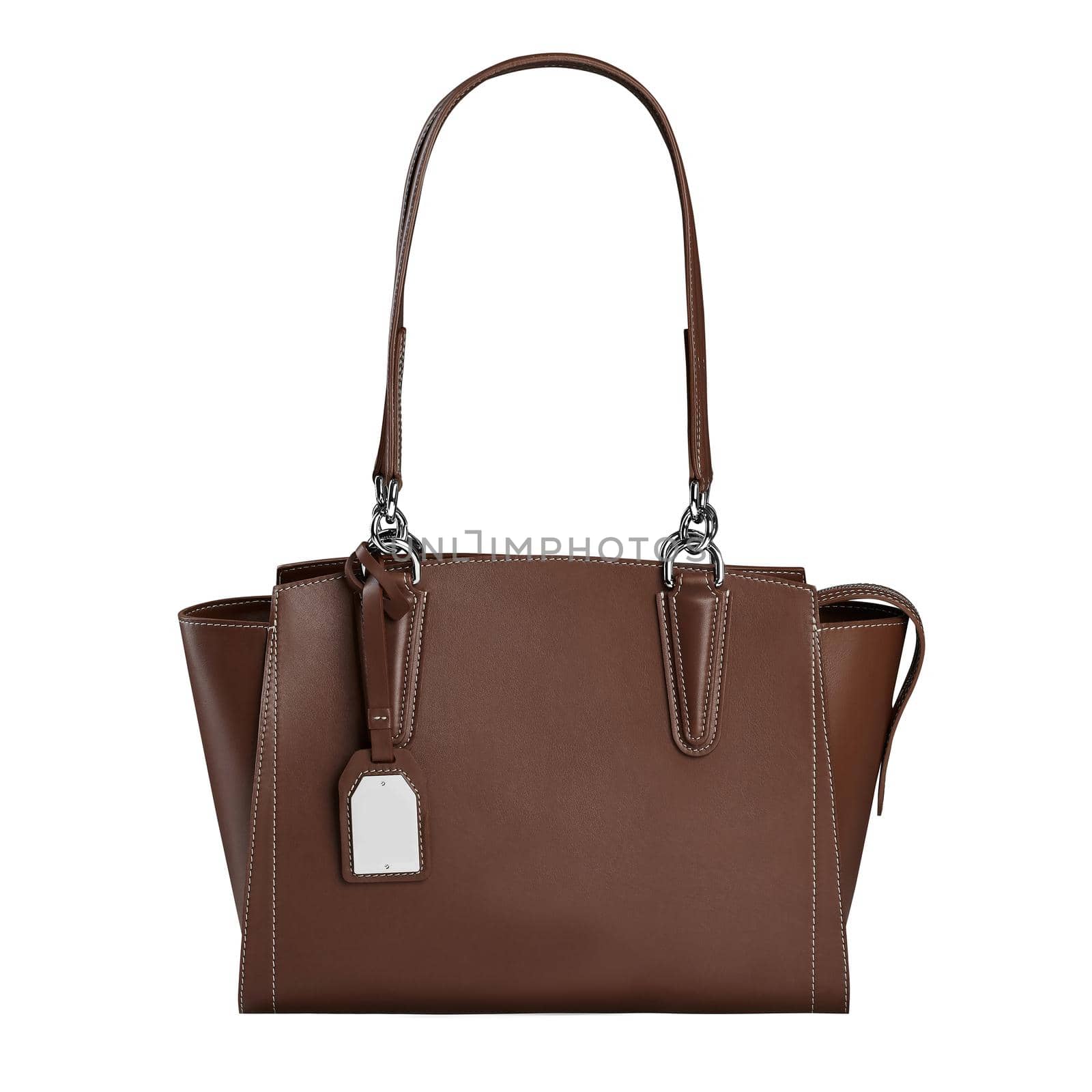 Closeup of trendy brown leather handbag with two handles, chrome fittings and blank labels isolated on white background. Exclusive accessories for women