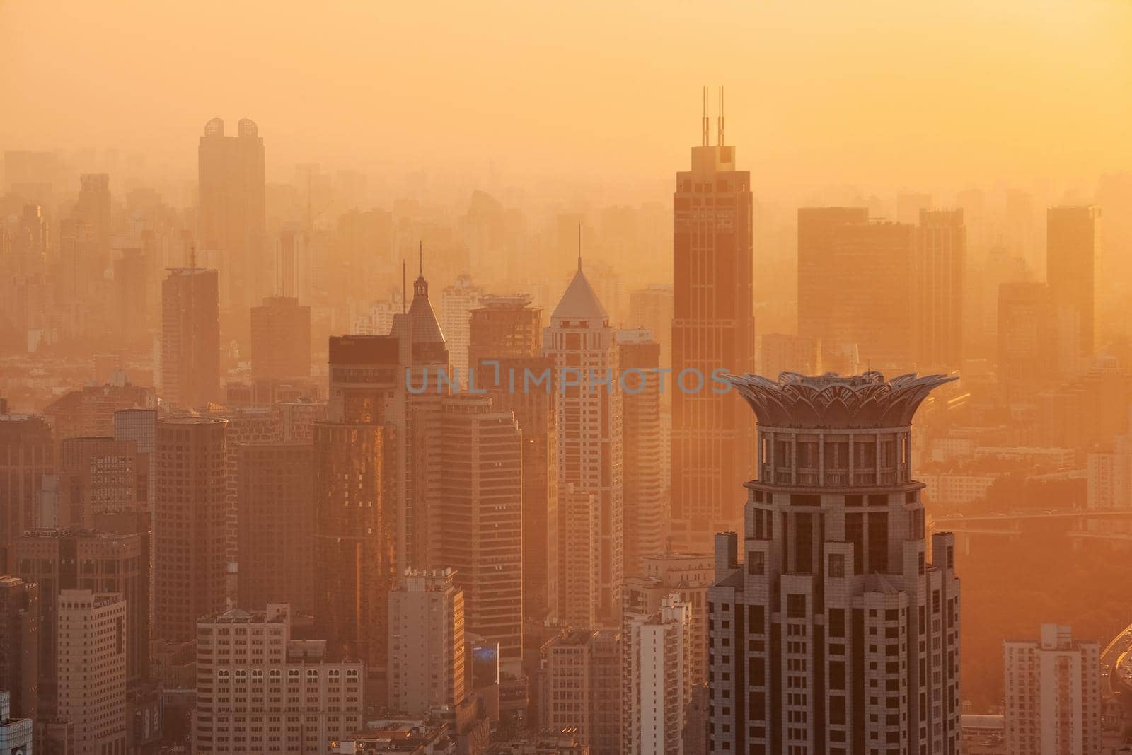 Sunset light over the skyline of urban architectural landscape in the Bund, Shanghai, China