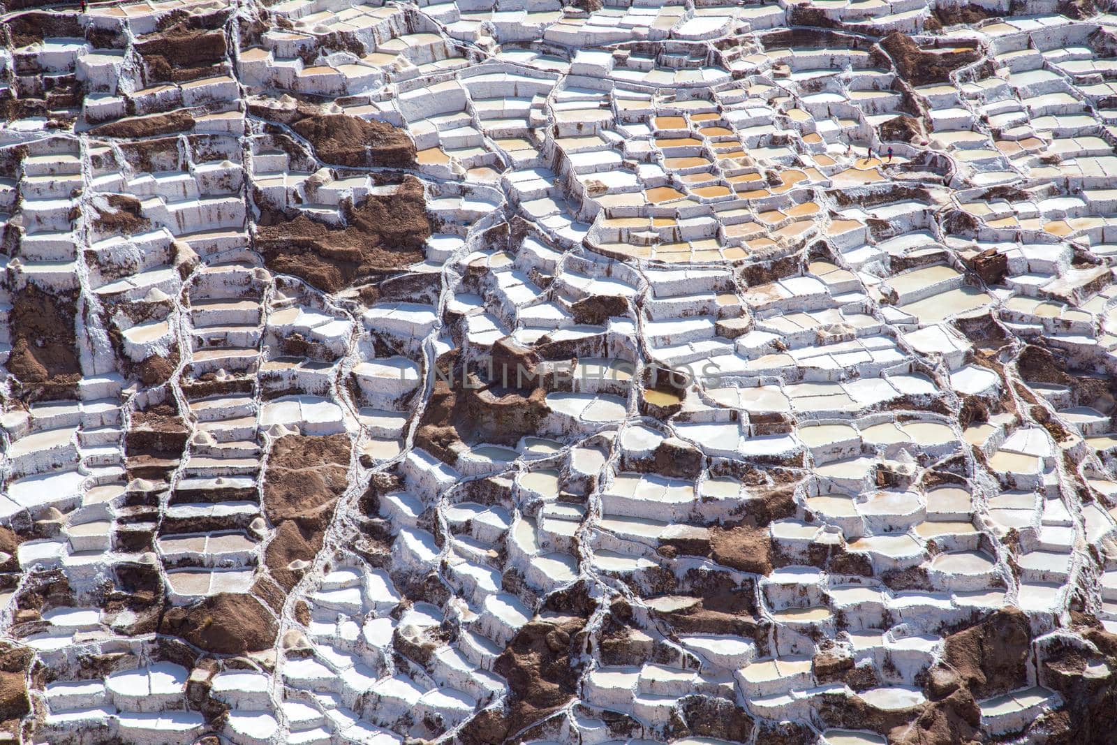 Maras, Peru - October 11, 2015: Salt evaporation ponds at the Maras salt mines