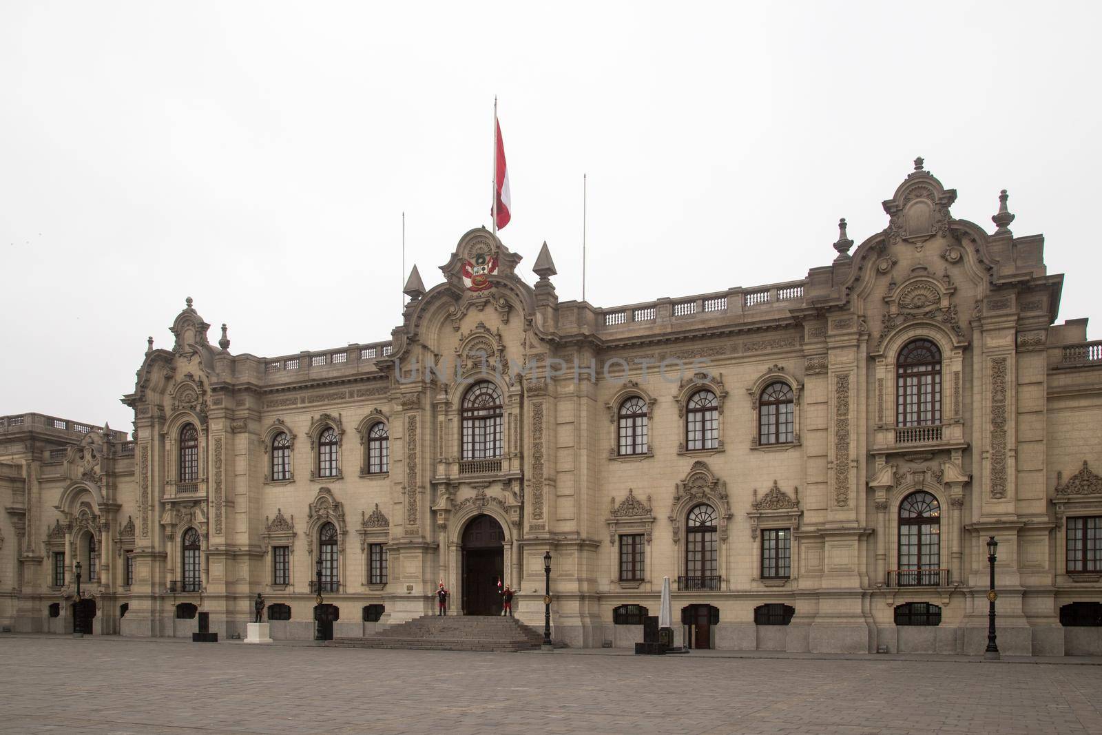 Lima, Peru - September 2, 2015: The Government Palace in the city centre with guards in front of it