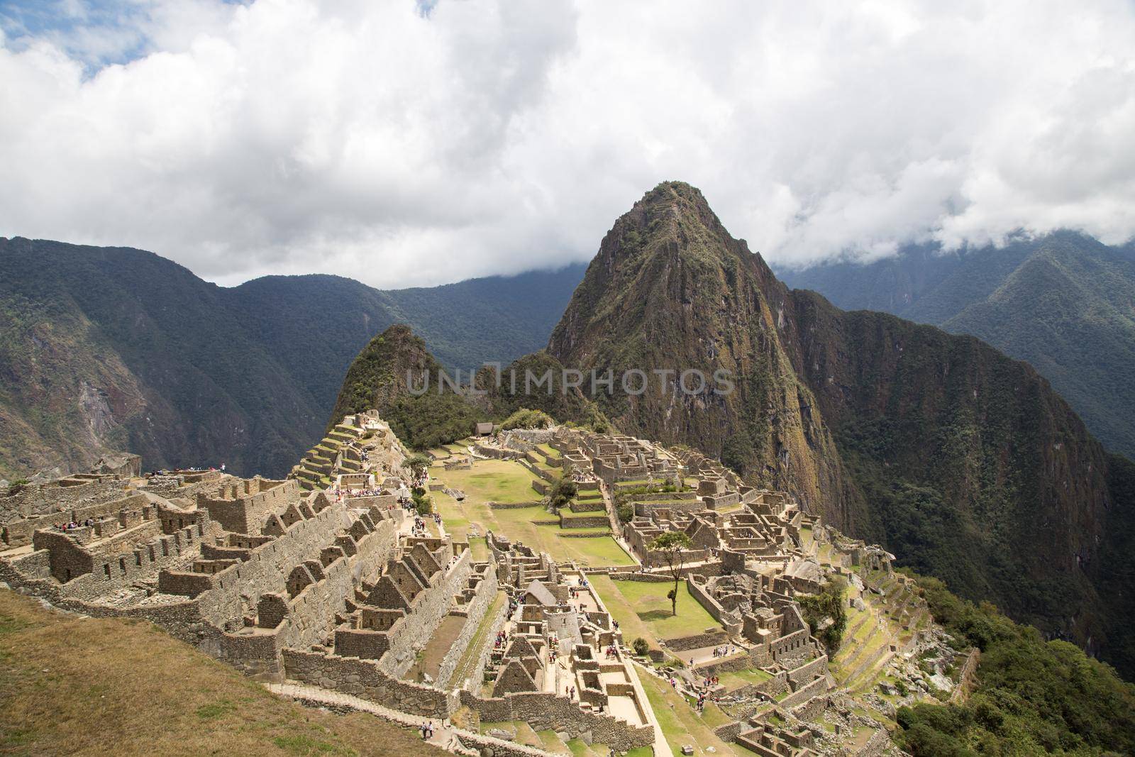 Aguas Calientes, Peru - October 12, 2015: Famous view of the ruins of the ancient Inca city Machu Picchu