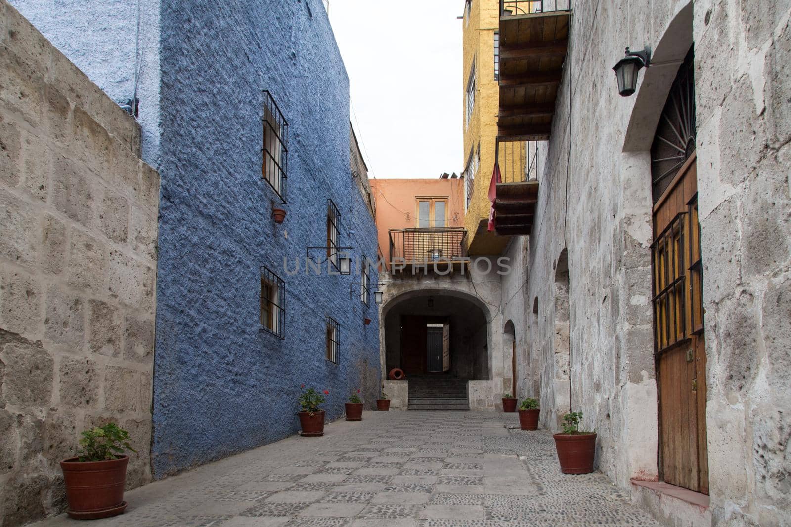 Arequipa, Peru - October 16, 2015: Colorful stone houses in a backyard