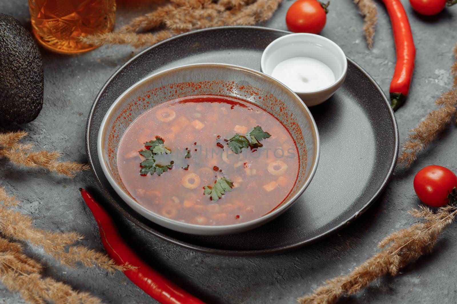 Traditional russian Solyanka or saltwort soup. Selective focus. photo for the menu, traditional food by UcheaD