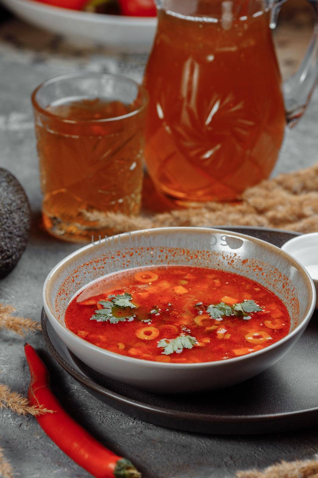 Traditional russian Solyanka or saltwort soup. Selective focus. photo for the menu, traditional food by UcheaD