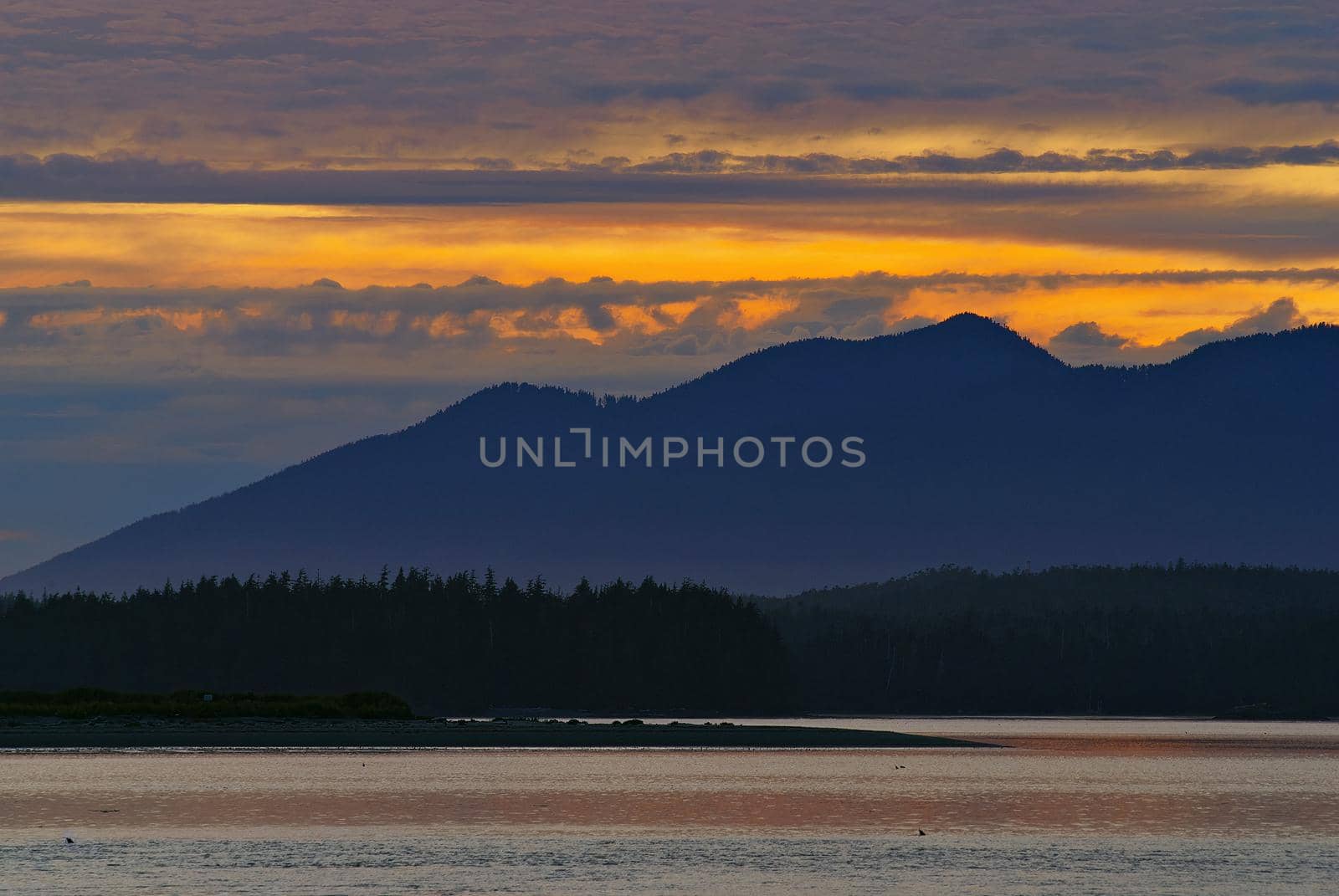 Sunset View of Mountains from Tofino on Vancouver Island in Canada. High quality photo