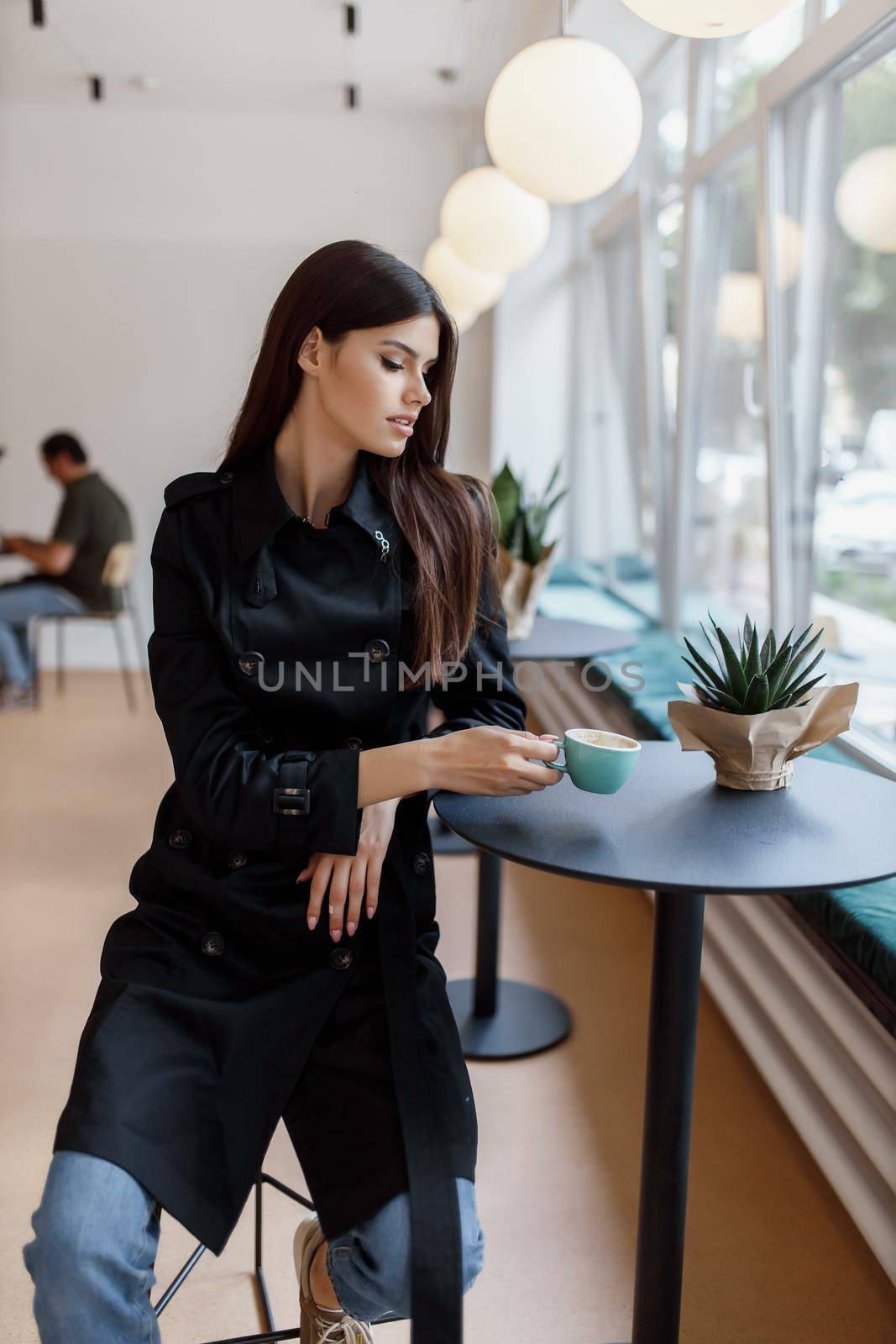 beautiful women in a coffee shop with a cup of coffee by UcheaD