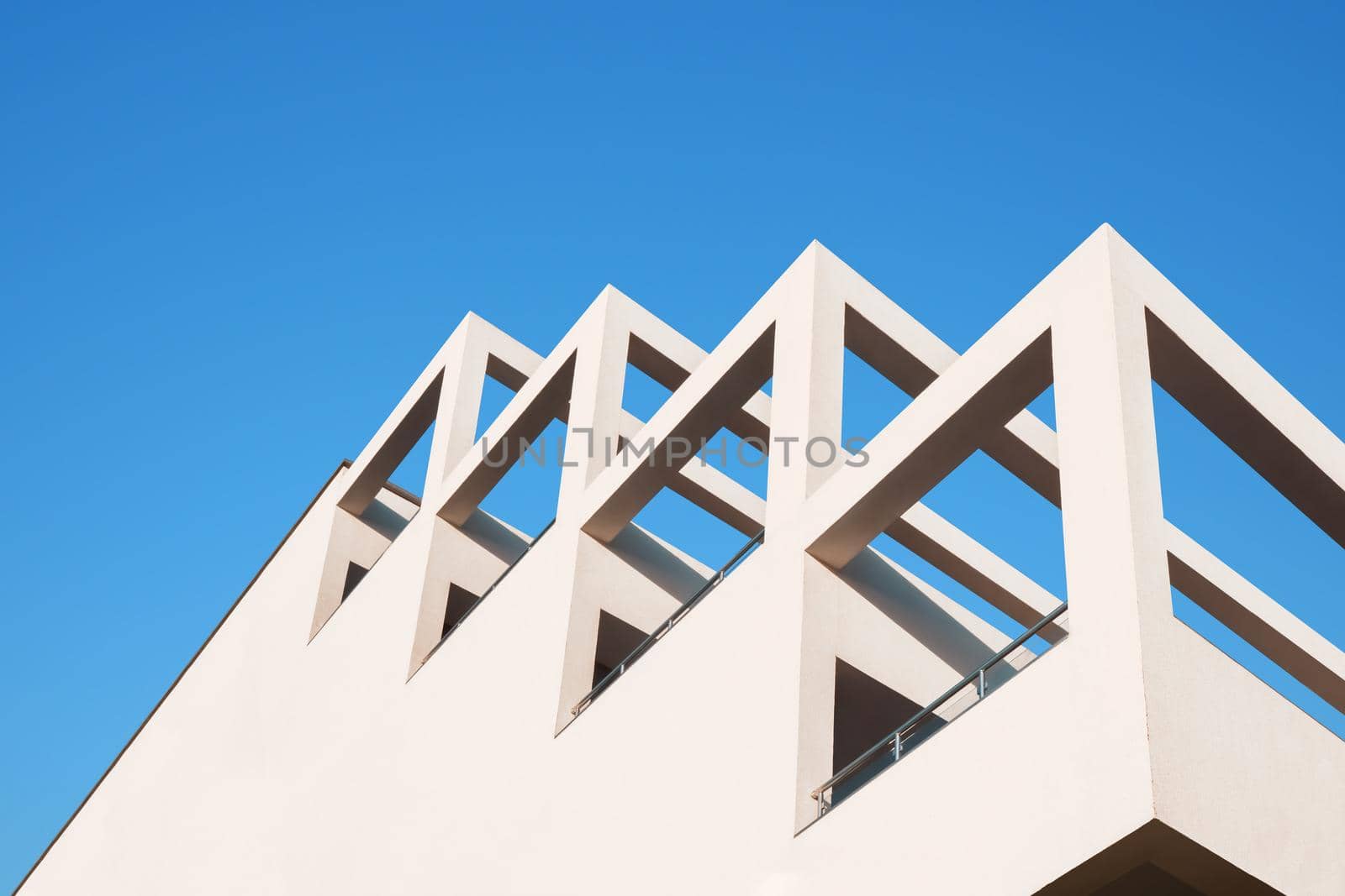 Abstract architecture geometric building modern pillar arch balcony construction. Geometry architecture design building balcony background. Modern architecture minimal building abstract concrete house by synel