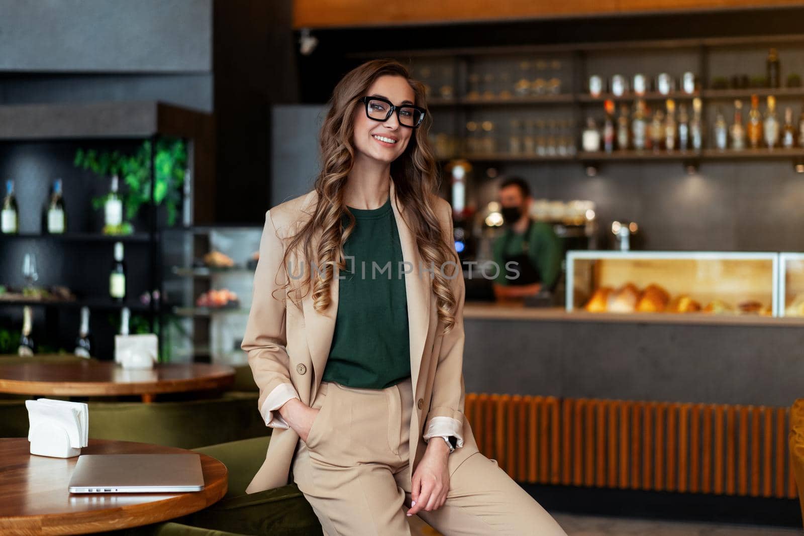 Business Woman Restaurant Owner Dressed Elegant Pantsuit Standing In Restaurant With Bar Counter Background Caucasian Female Glasses Business Person Indoor hands in pockets