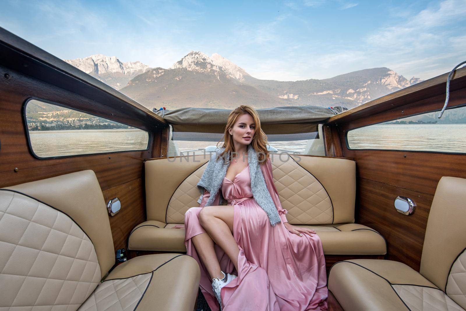 Luxury boat trip at Lake Como at romantic honeymoon. Luxury wedding and holiday concept. High quality photo