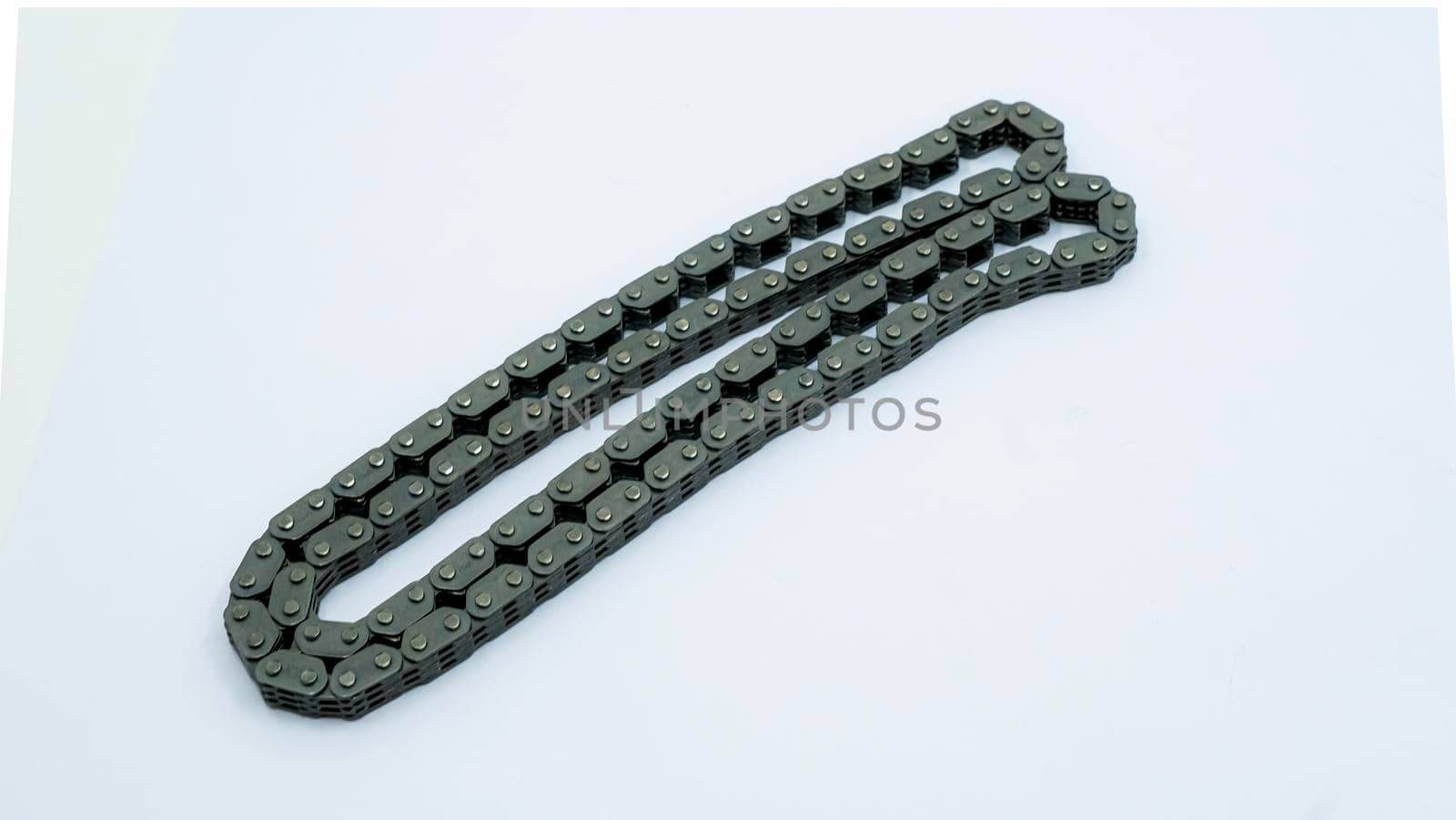 cam chain for 4-stroke valve engine for motorcycles. High quality photo