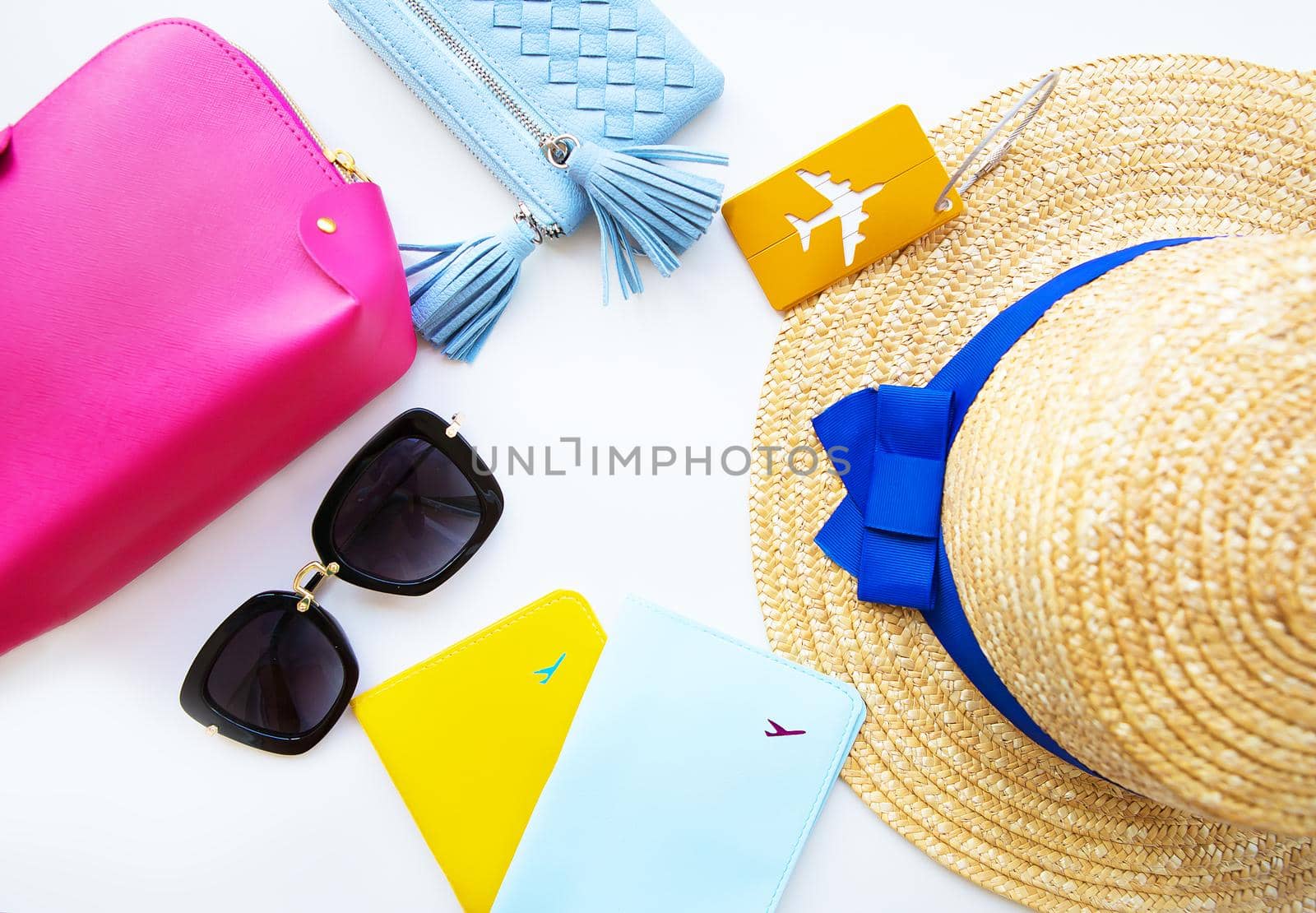 Preparation for vacation - hat, glasses, passport, cosmetic bag, purse Close-up