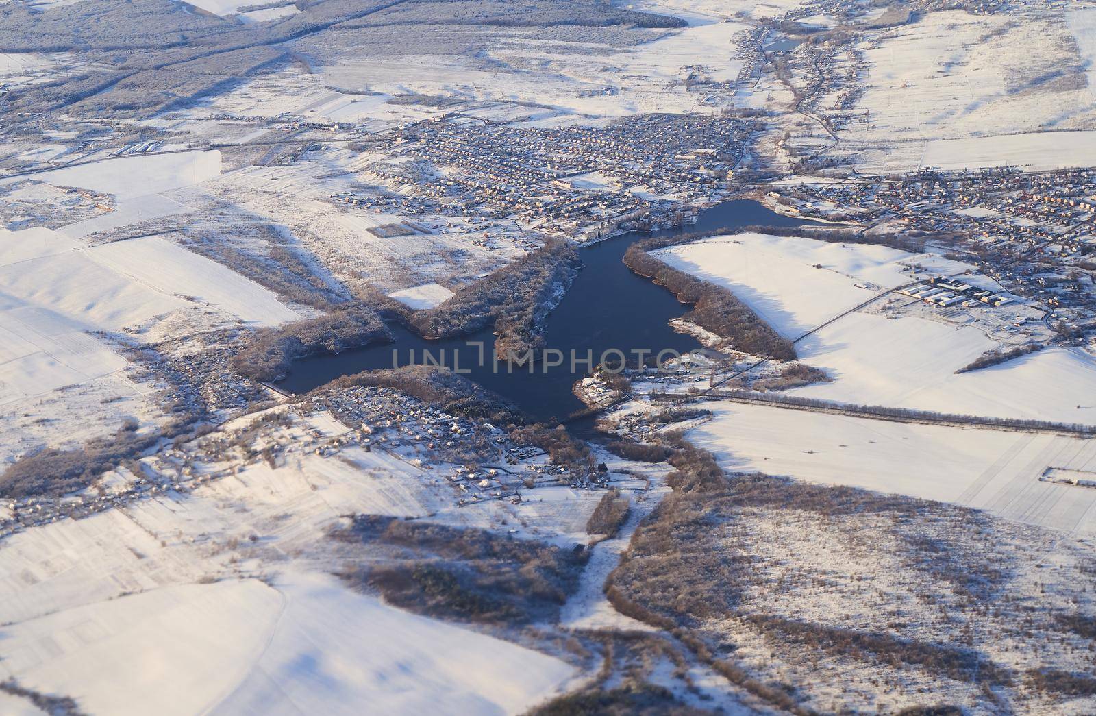 Aerial view of Hlynna Navaria lake in winter