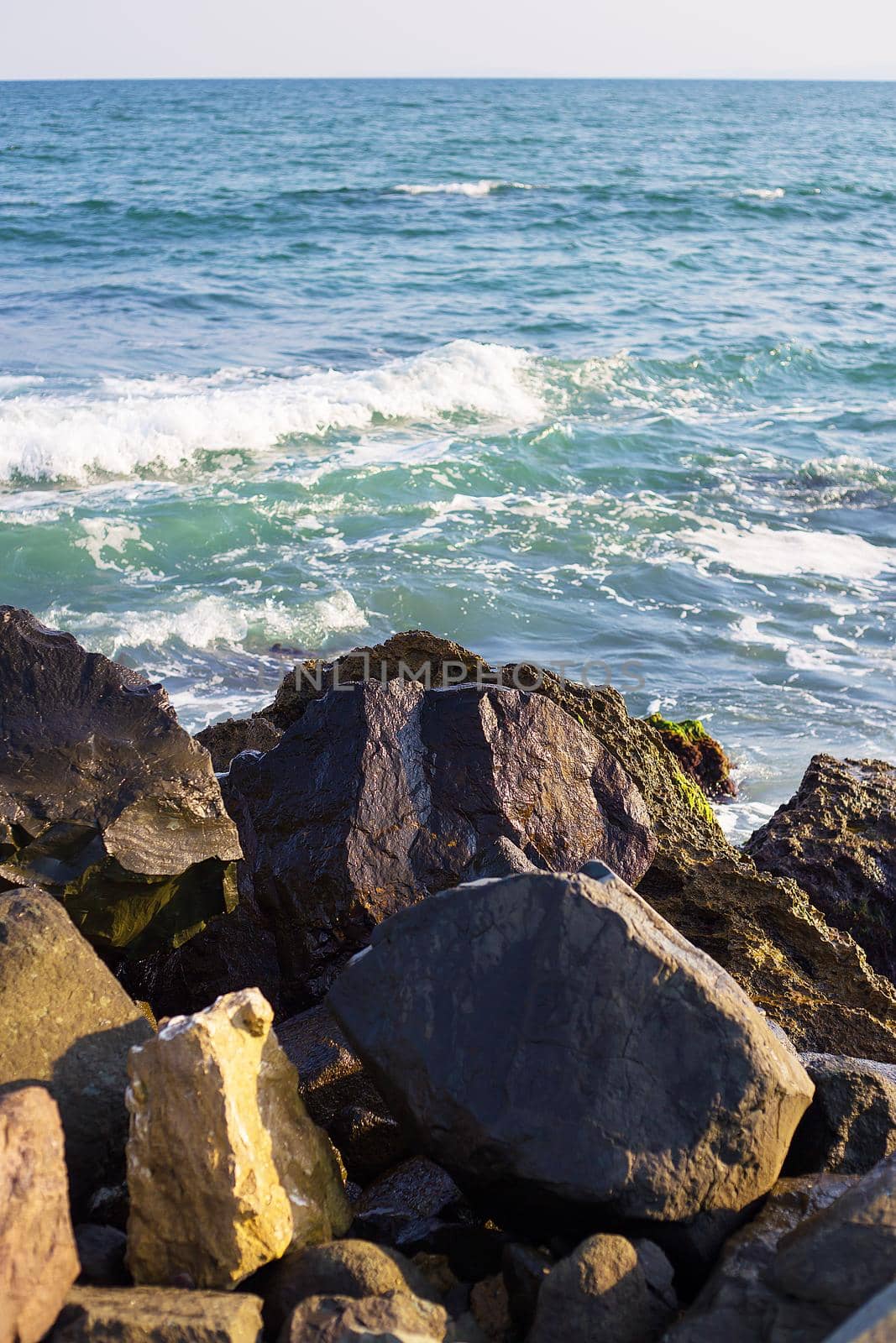 Stony sea coast of Bulgaria-sun, sea, beach.