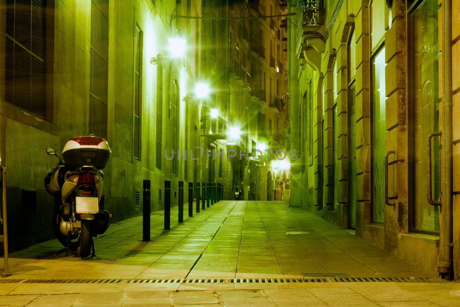 illuminated Barcelona night street in famous Gothic Quarter district