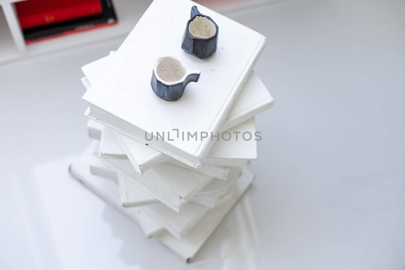 stack of books and the stand of books on white background.