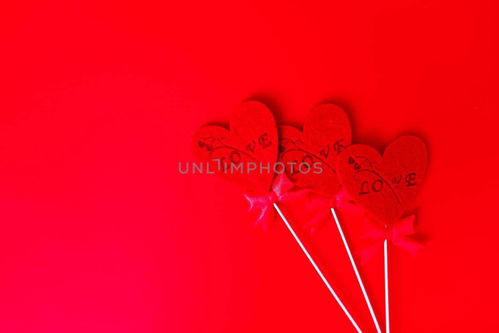 Valentine's day frame red hearts on red background.