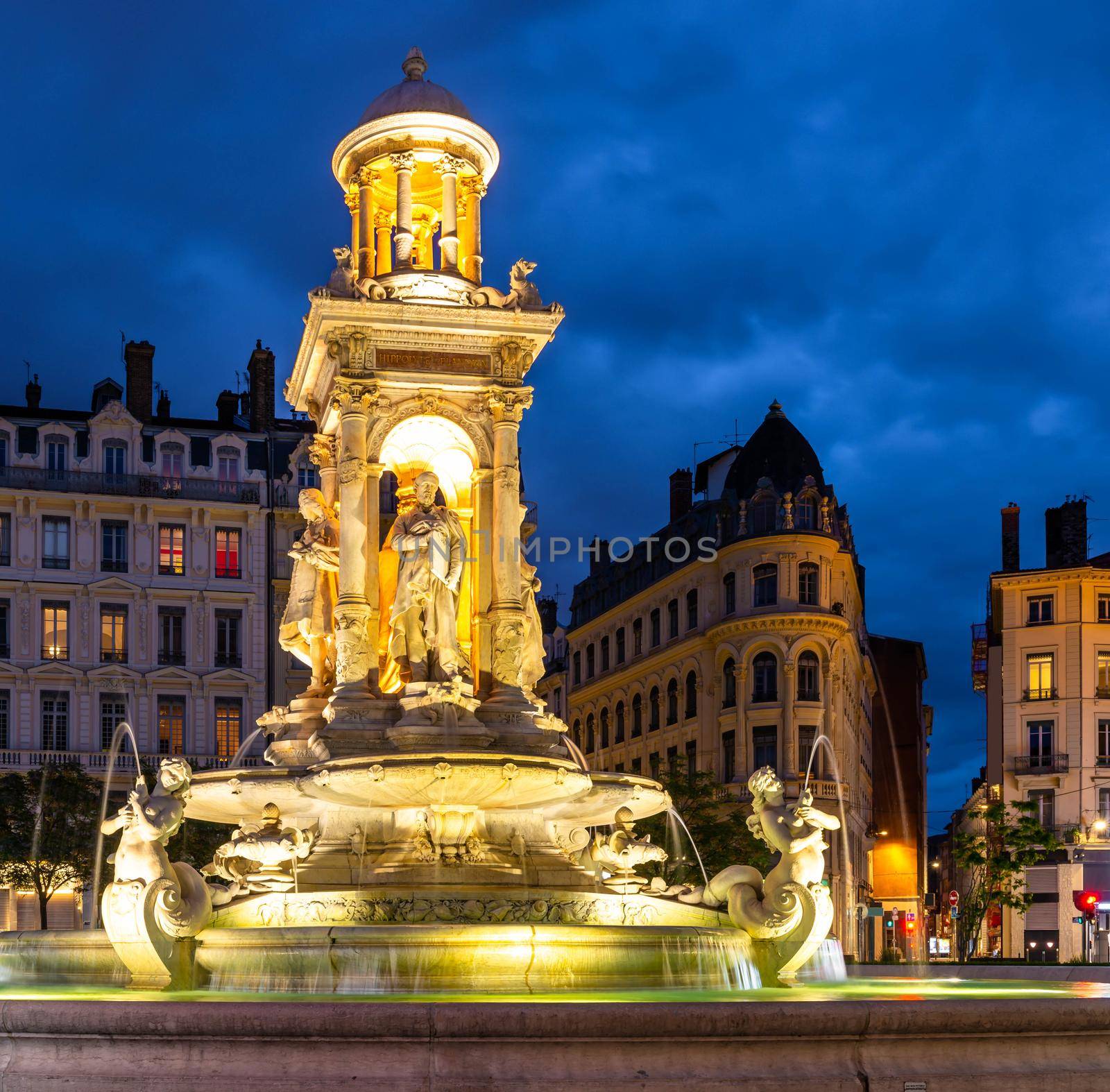 Illuminated fountain on the square of the  Jacobins in Lyon in the Rhone, France by Frederic