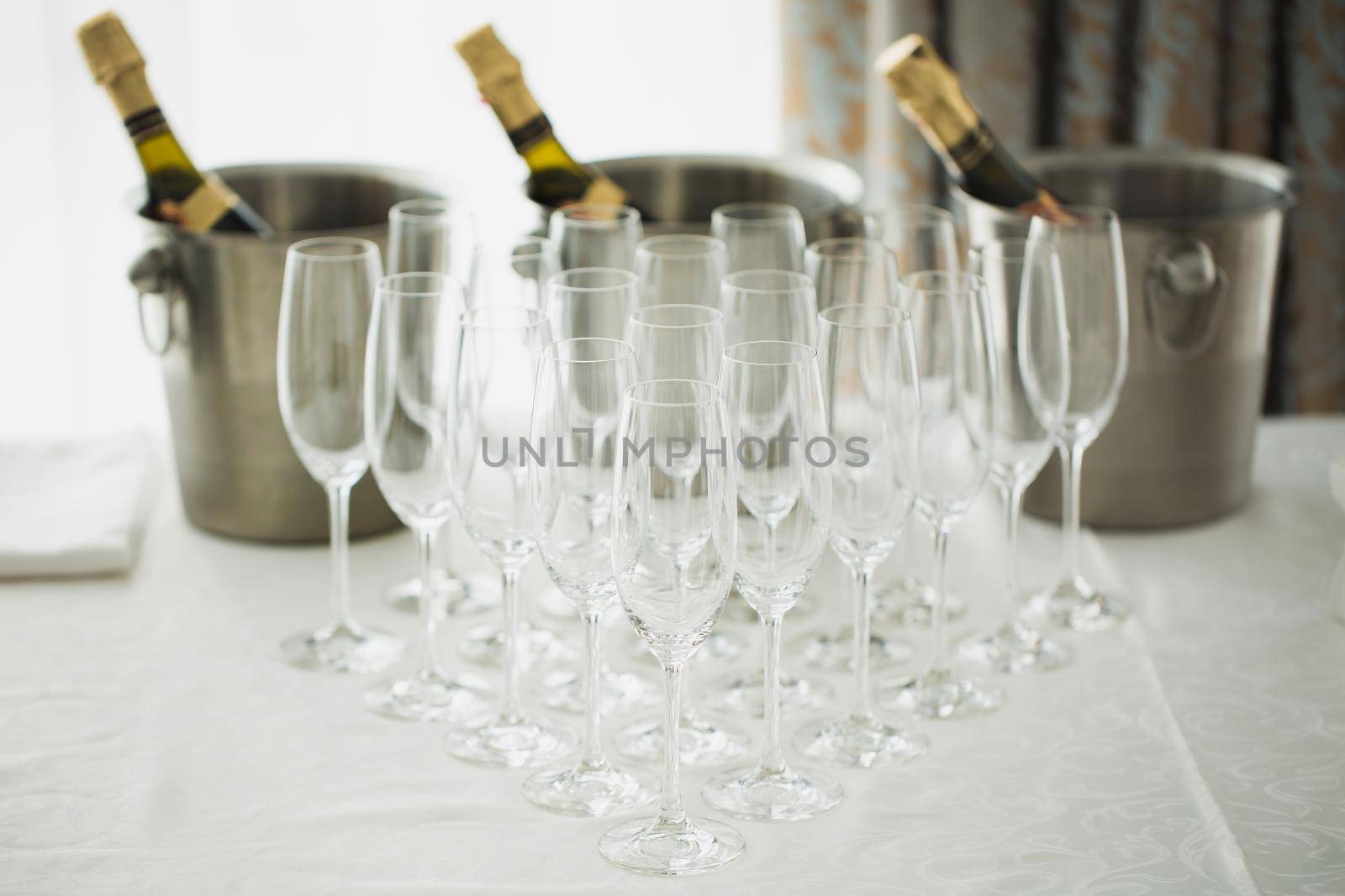 Champagne bottle with glasses. Celebration theme with champagne still life. by StudioPeace